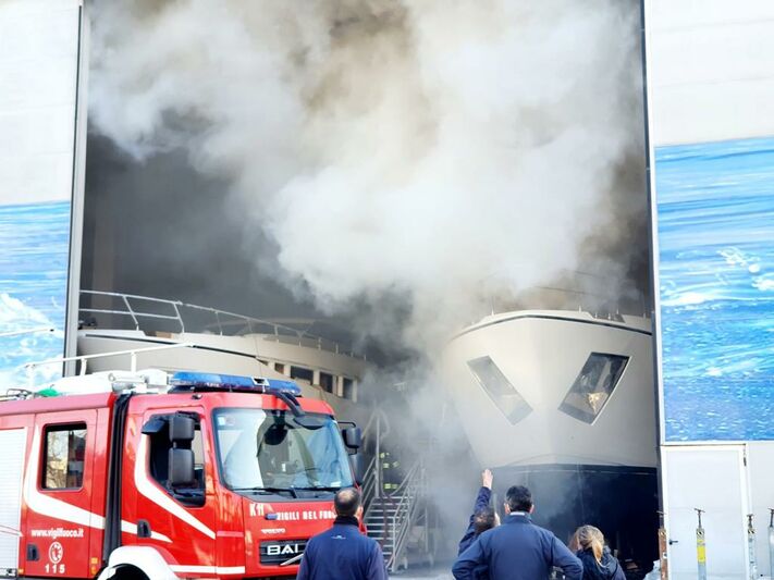 The Fire brigade arrive at the Ferreti Shipyard to tackle to yacht fire 