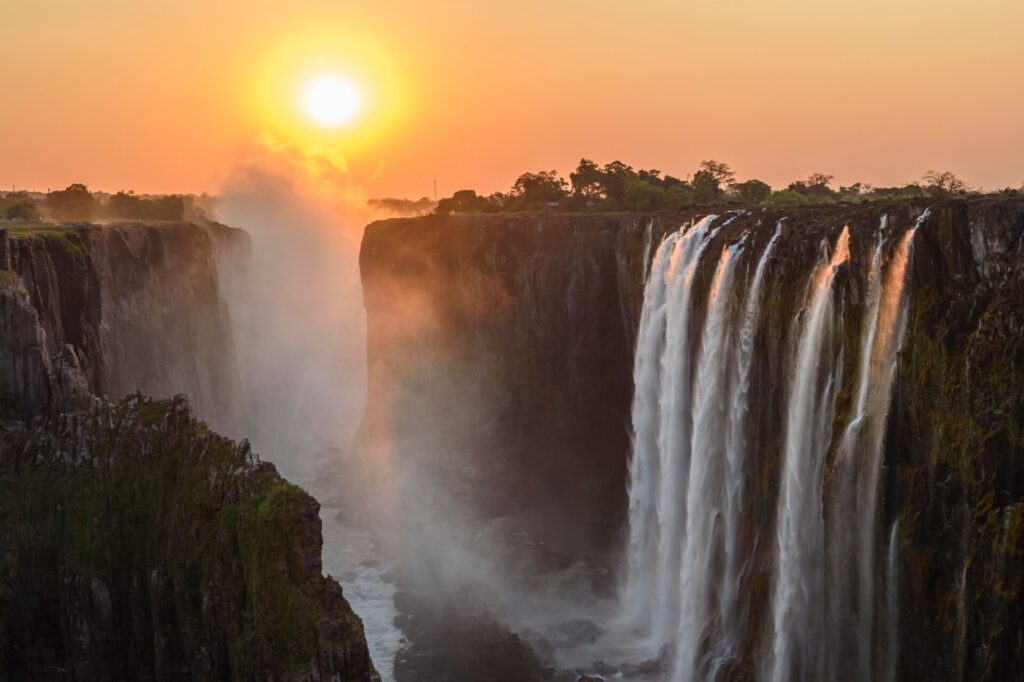 Which African safari is best - Sunset over Victoria Falls